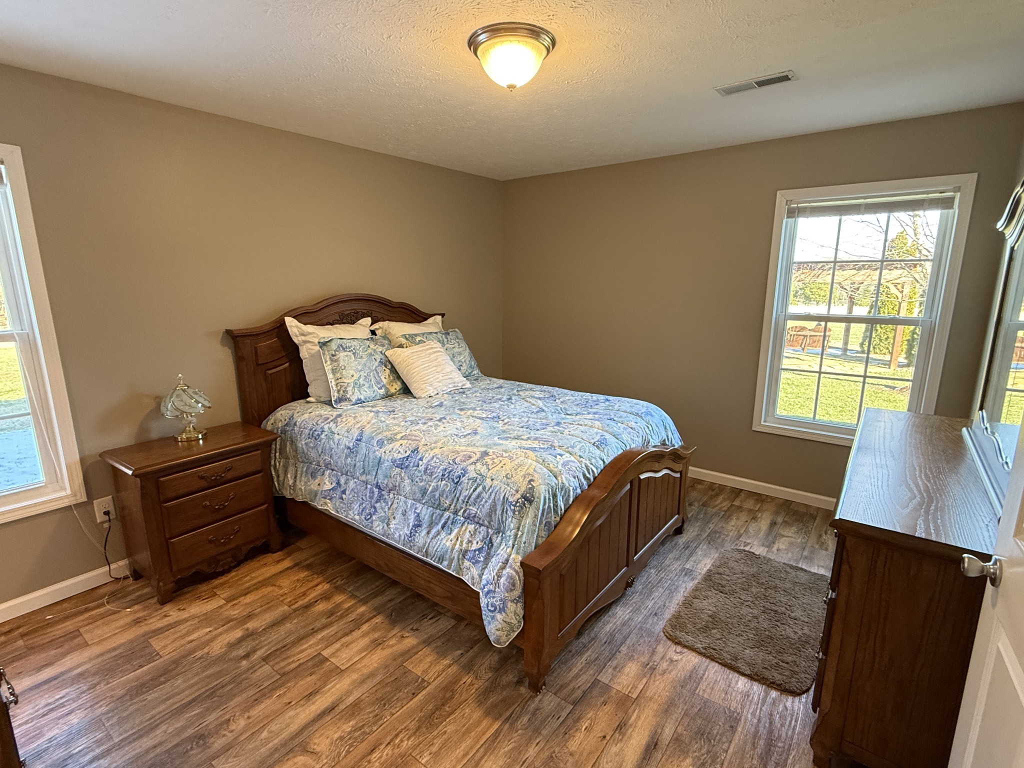 334 North Centerpoint Road Portland, TN 37148 - Photo 30 of 43 a bed sitting in a bedroom next to a window