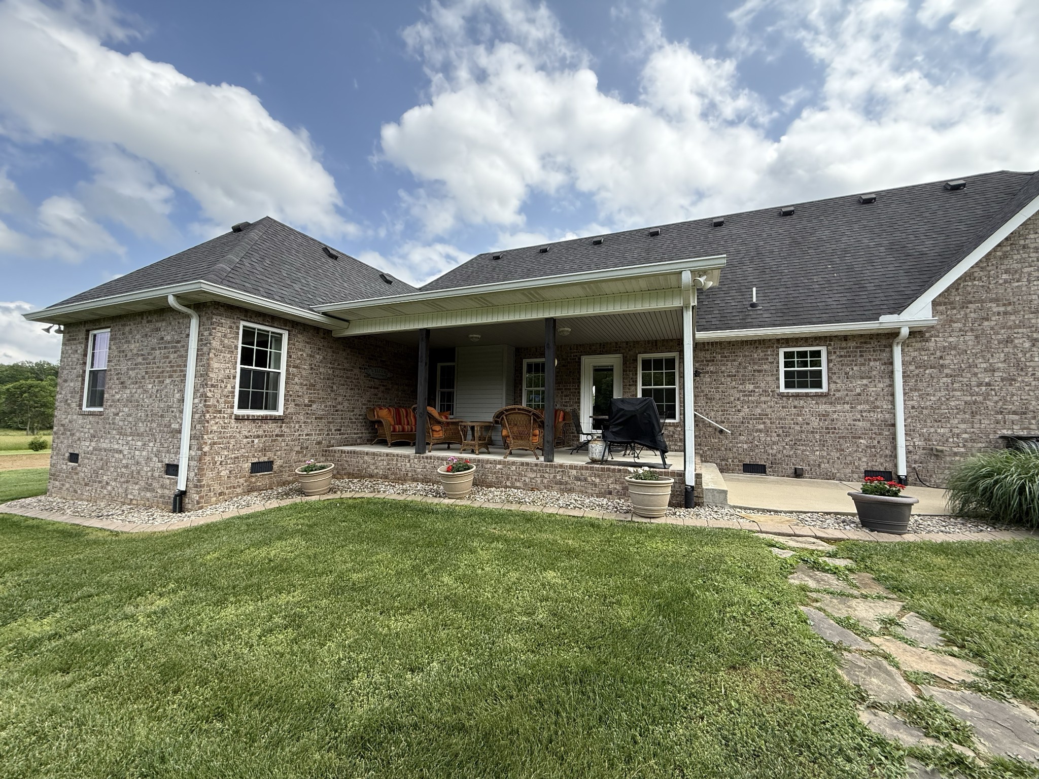 334 North Centerpoint Road Portland, TN 37148 - Photo 3 of 43 a front view of a house with a yard and porch