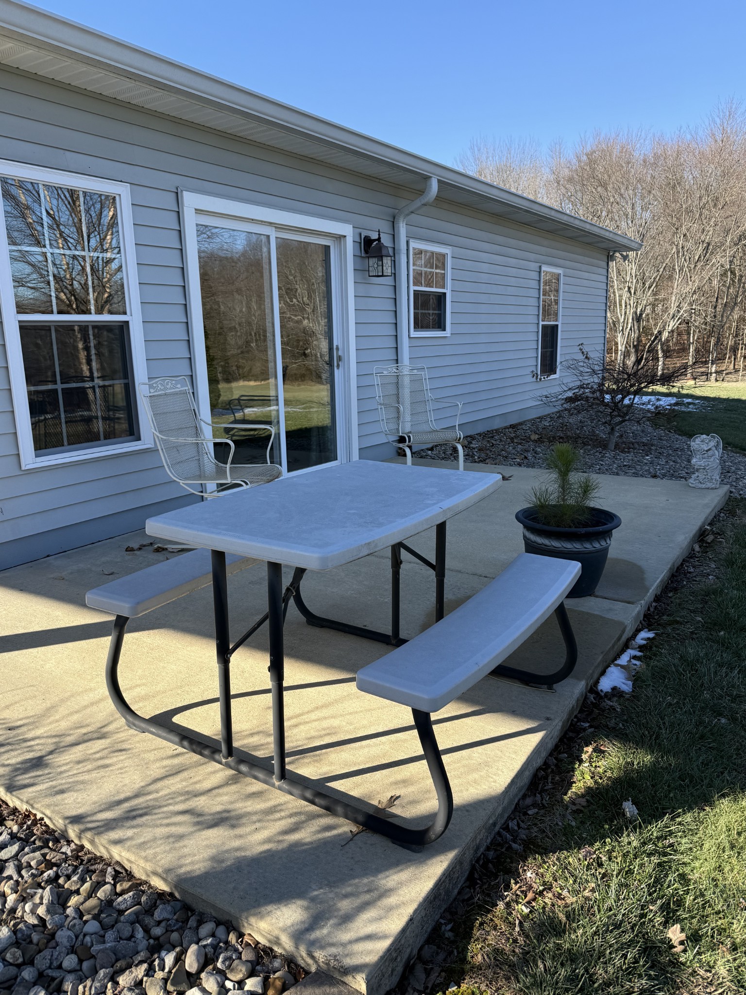 334 North Centerpoint Road Portland, TN 37148 - Photo 39 of 43 a view of a lounge chairs in the back yard of the house