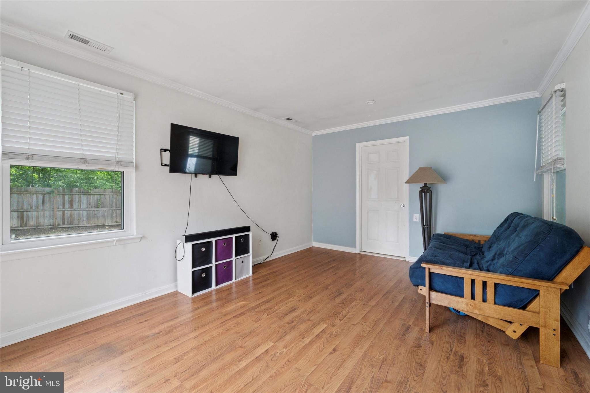 37 Brookview Drive Atco, NJ 08004 - Photo 11 of 27 a living room with furniture and a flat screen tv