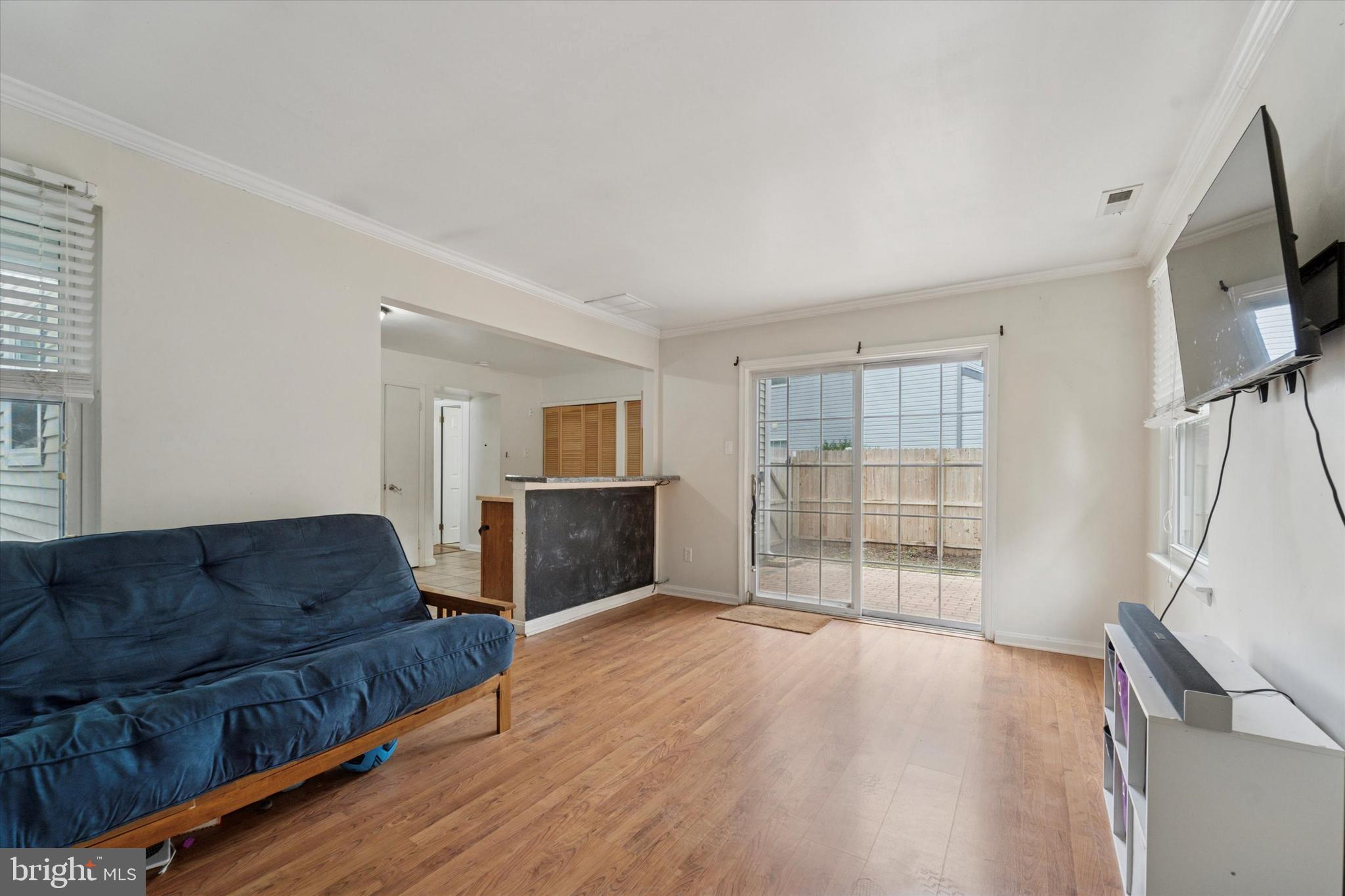 37 Brookview Drive Atco, NJ 08004 - Photo 14 of 27 a living room with furniture a flat screen tv and a fireplace