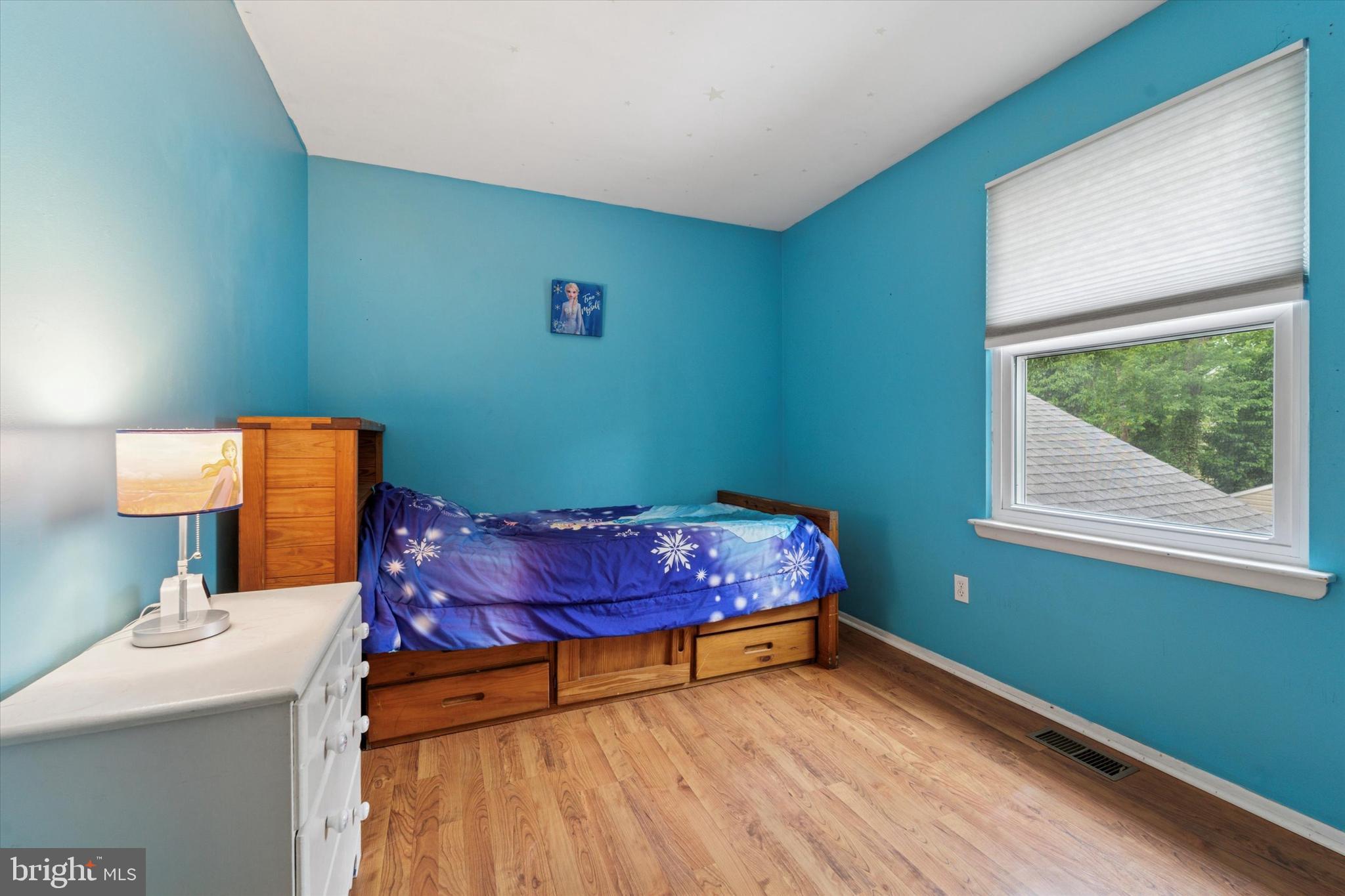37 Brookview Drive Atco, NJ 08004 - Photo 17 of 27 a bedroom with a bed and a lamp on table