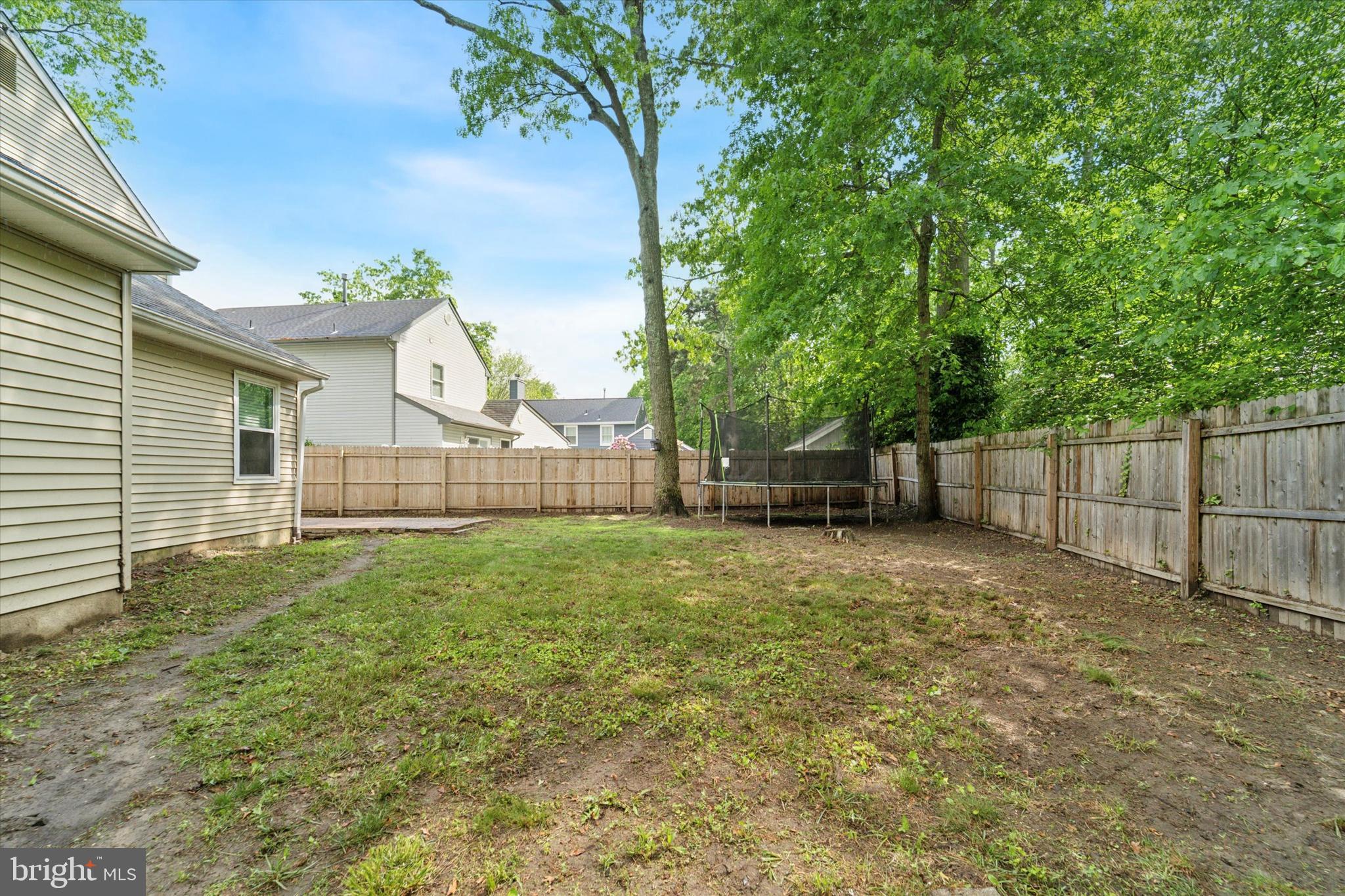37 Brookview Drive Atco, NJ 08004 - Photo 24 of 27 a view of a backyard with a trees
