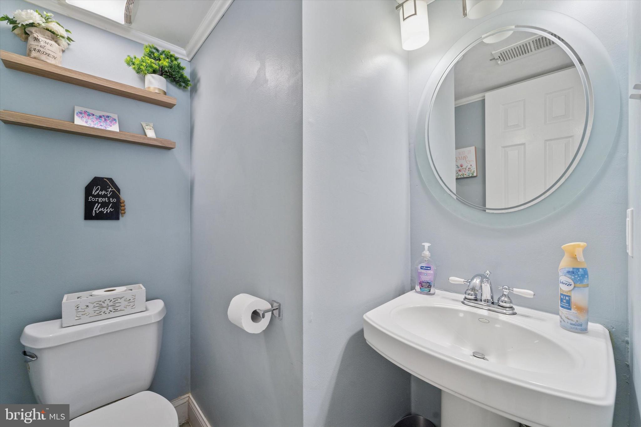 37 Brookview Drive Atco, NJ 08004 - Photo 5 of 27 a bathroom with a toilet sink and mirror