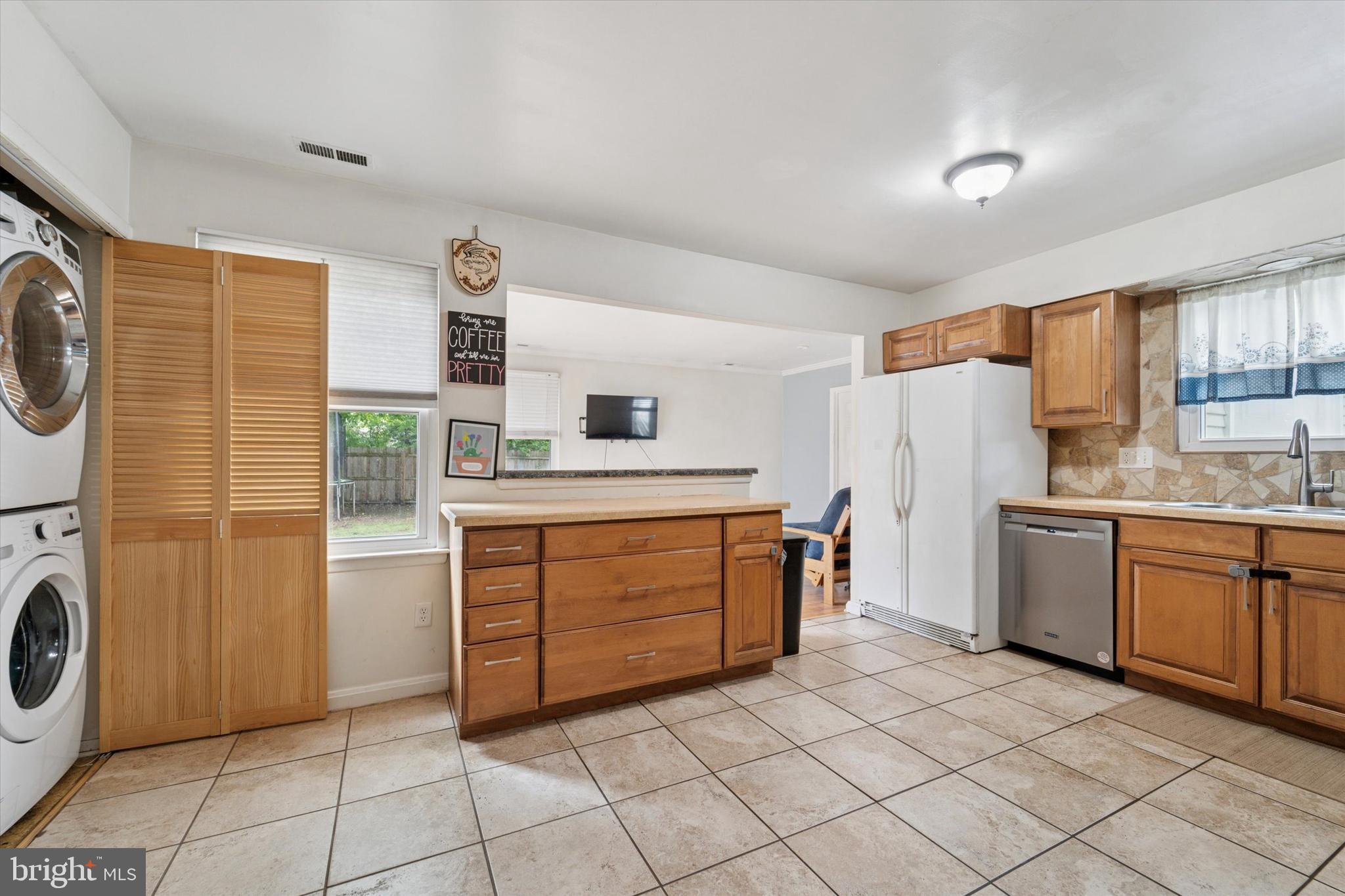 37 Brookview Drive Atco, NJ 08004 - Photo 6 of 27 a kitchen with a refrigerator sink and cabinets