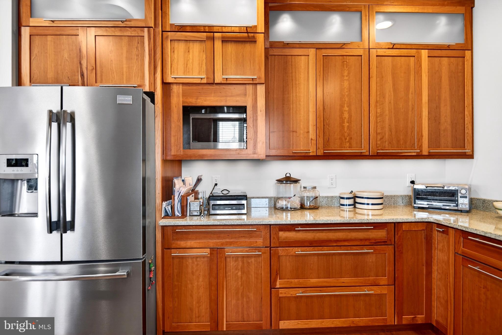 20 Edgewater Drive Tuckerton, NJ 08087 - Photo 10 of 78 Sleek kitchen with warm wood accents.