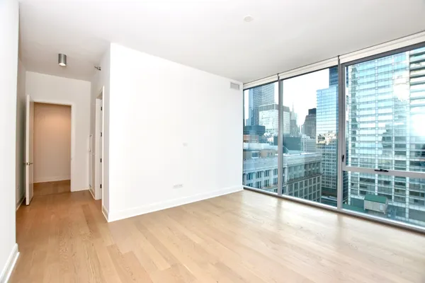 a very nice looking living room with a large window