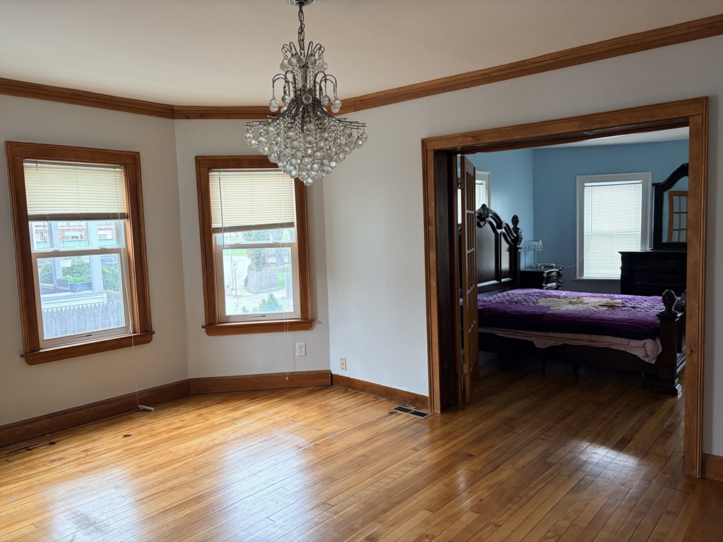 91 Ward Street, Unit 1 Worcester, MA 01610 - Photo 1 of 12 a view of a livingroom with furniture window and wooden floor
