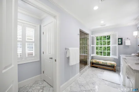 a room with a bed and a window