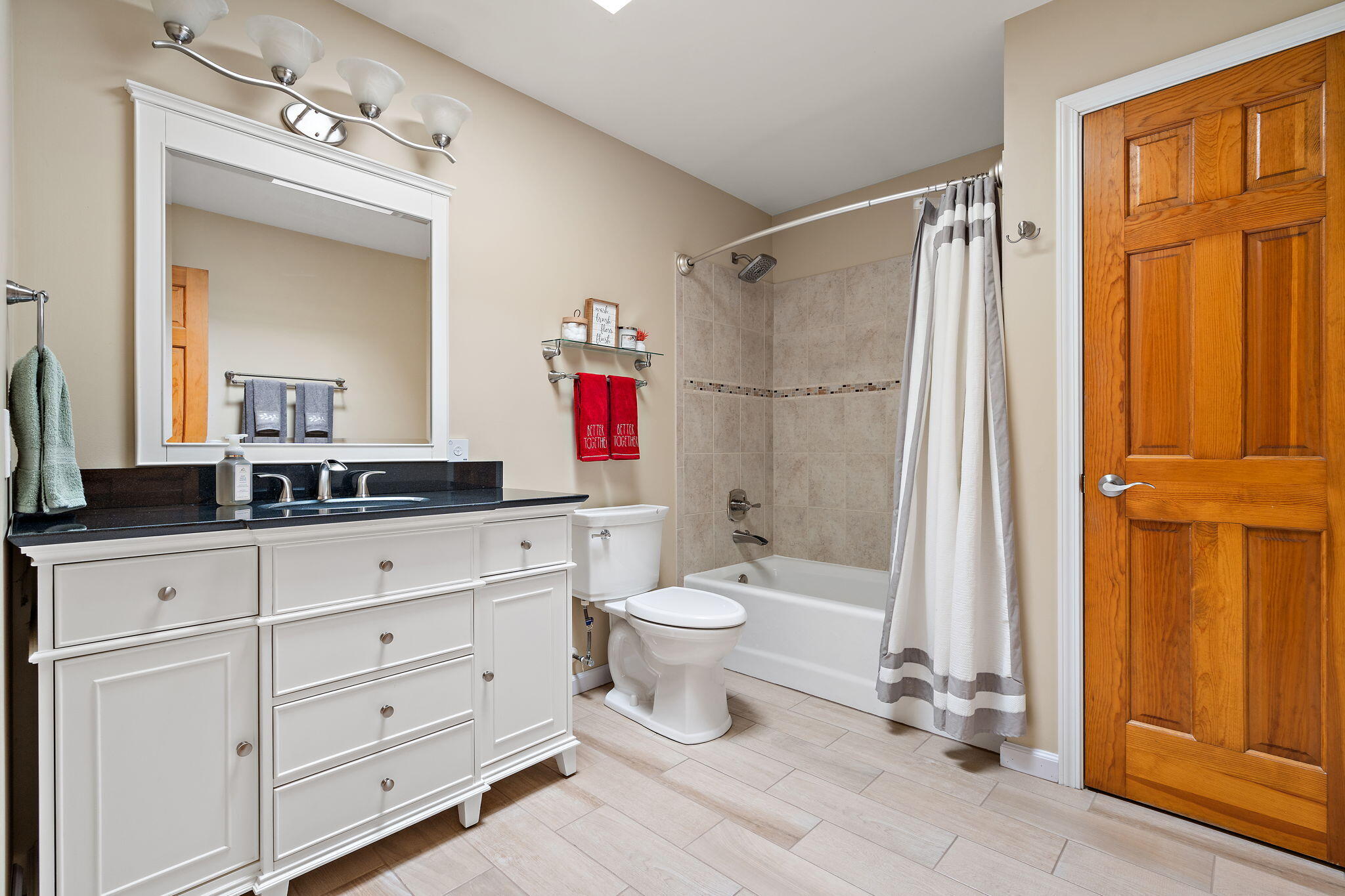 2164 Terrace Drive Highland, IN 46322 - Photo 16 of 34 a bathroom with a double vanity sink toilet and shower