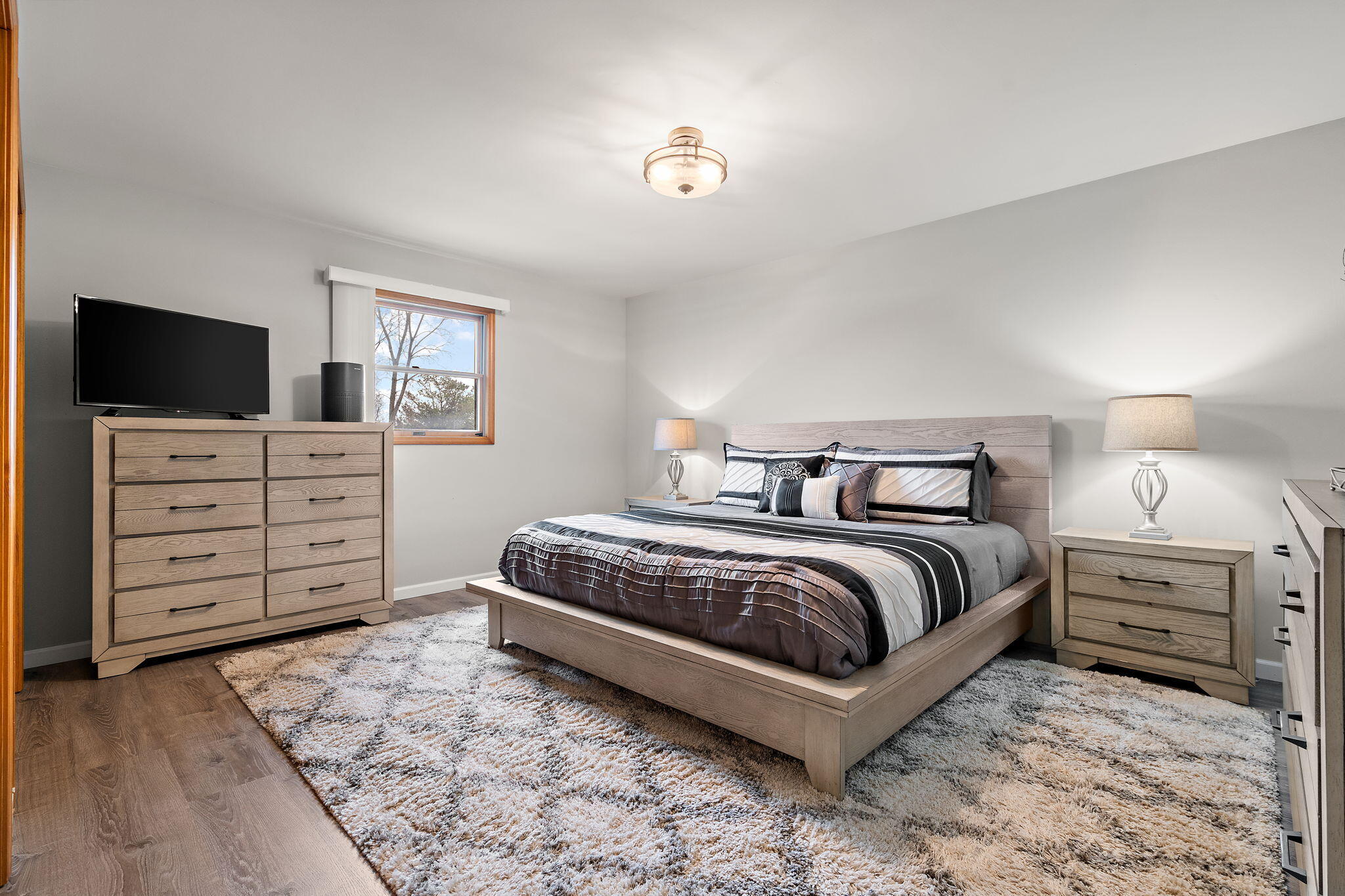 2164 Terrace Drive Highland, IN 46322 - Photo 17 of 34 a bedroom with a bed and flat screen tv