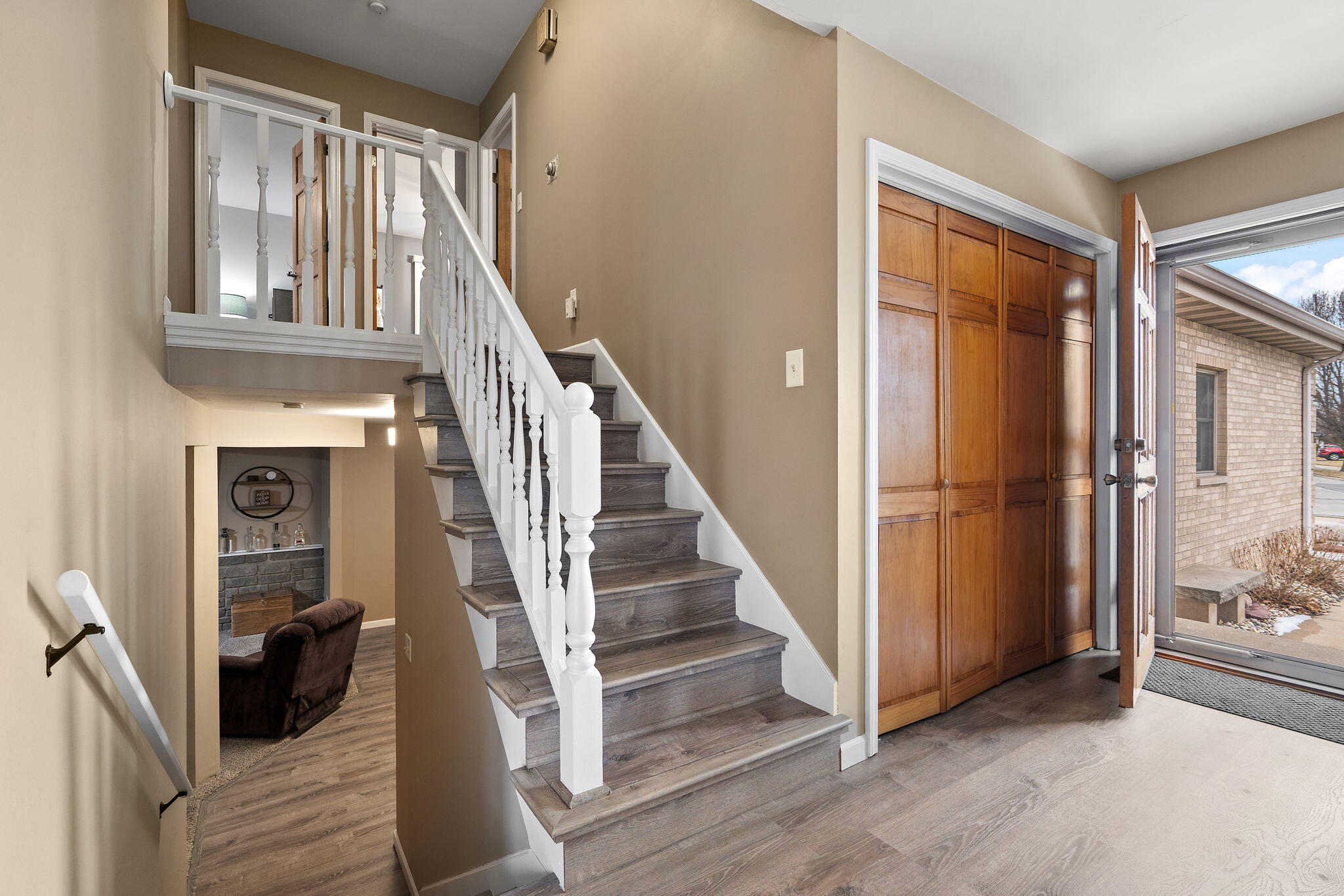 2164 Terrace Drive Highland, IN 46322 - Photo 20 of 34 a view of entryway with wooden floor and stair