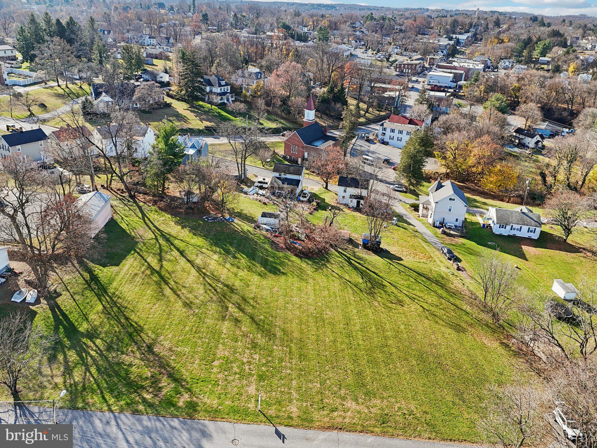 Harrison St Mount Mount Airy, MD 21771 - Photo 11 of 35 an aerial view of residential houses with outdoor space