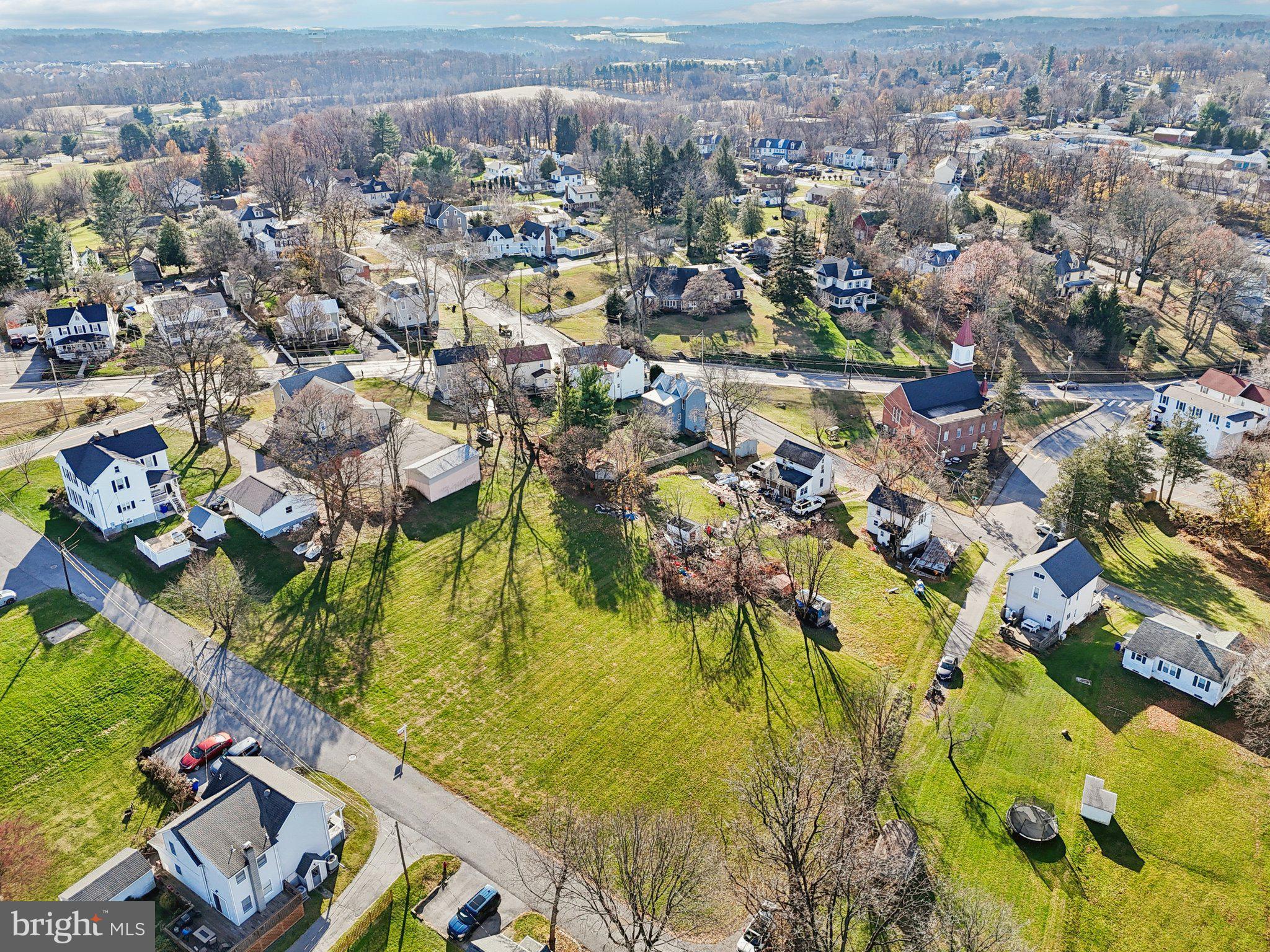 Harrison St Mount Mount Airy, MD 21771 - Photo 13 of 35 an aerial view of residential houses with outdoor space