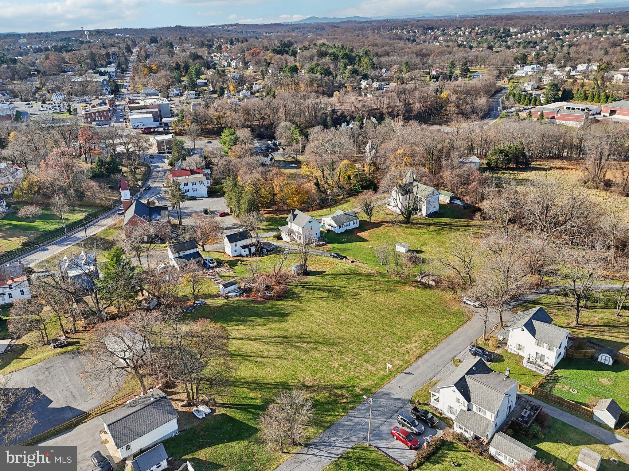 Harrison St Mount Mount Airy, MD 21771 - Photo 15 of 35 an aerial view of residential houses with outdoor space