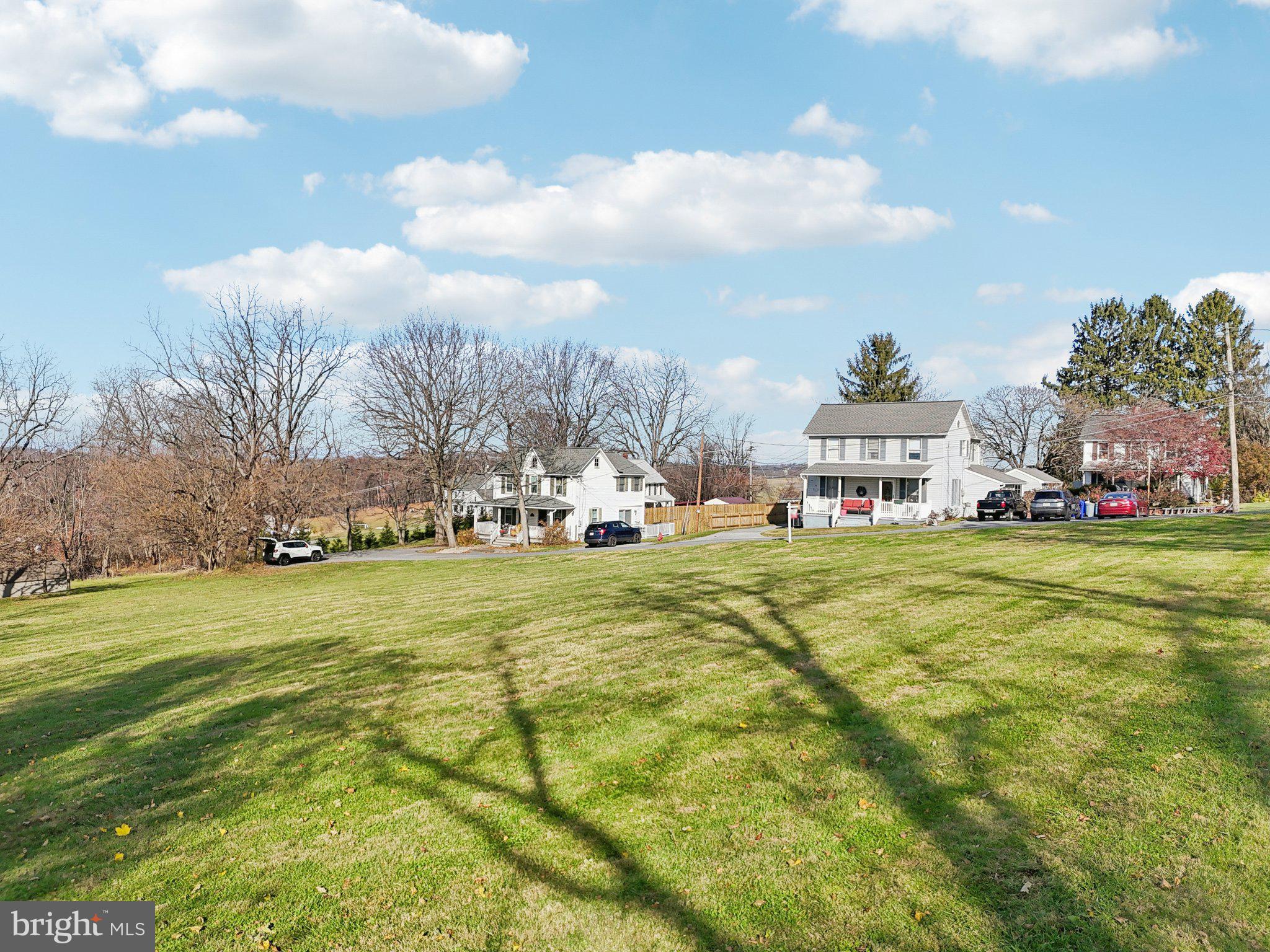 Harrison St Mount Mount Airy, MD 21771 - Photo 2 of 35 a view of a big yard with houses