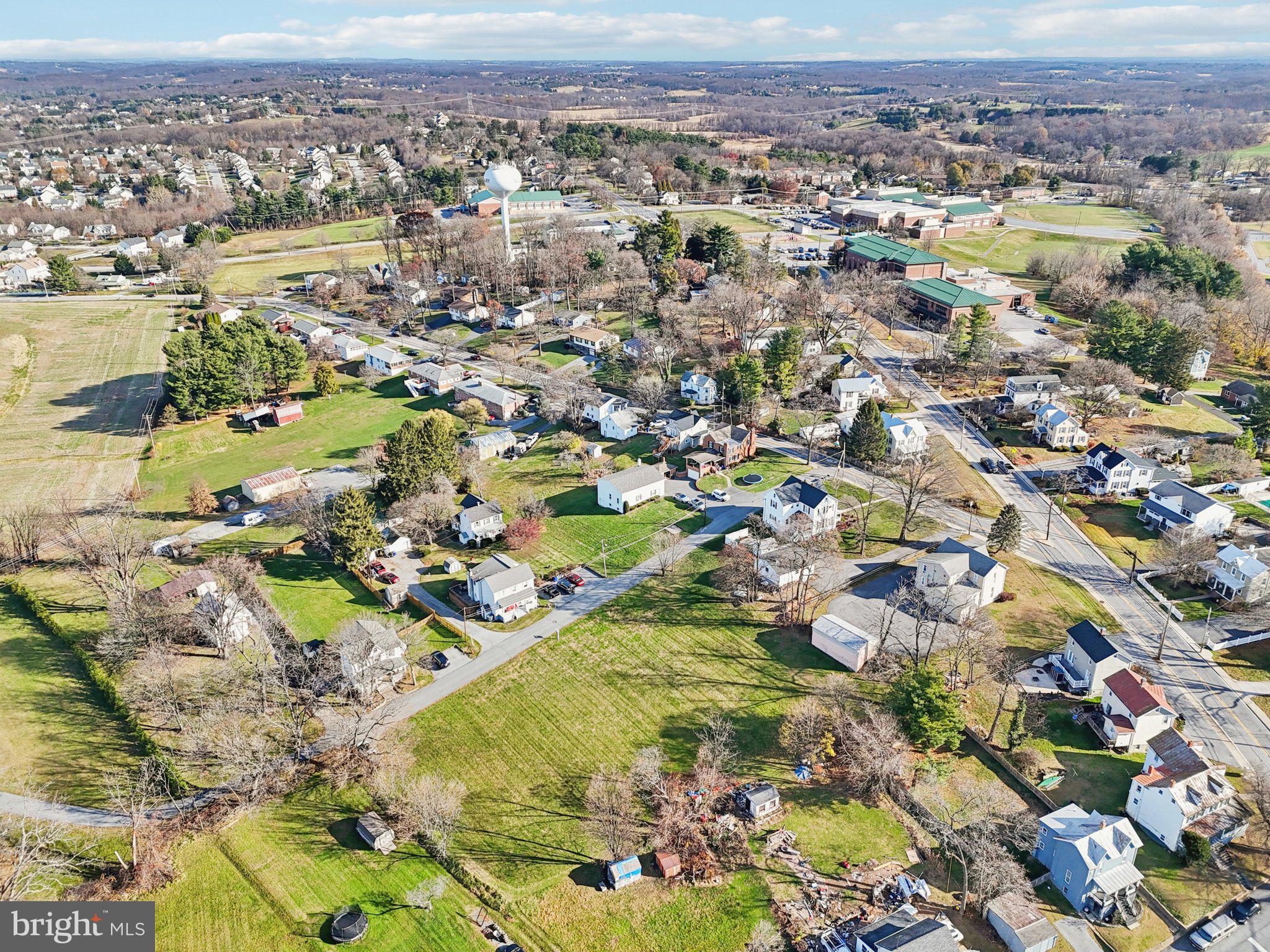 Harrison St Mount Mount Airy, MD 21771 - Photo 25 of 35 an aerial view of residential houses with outdoor space