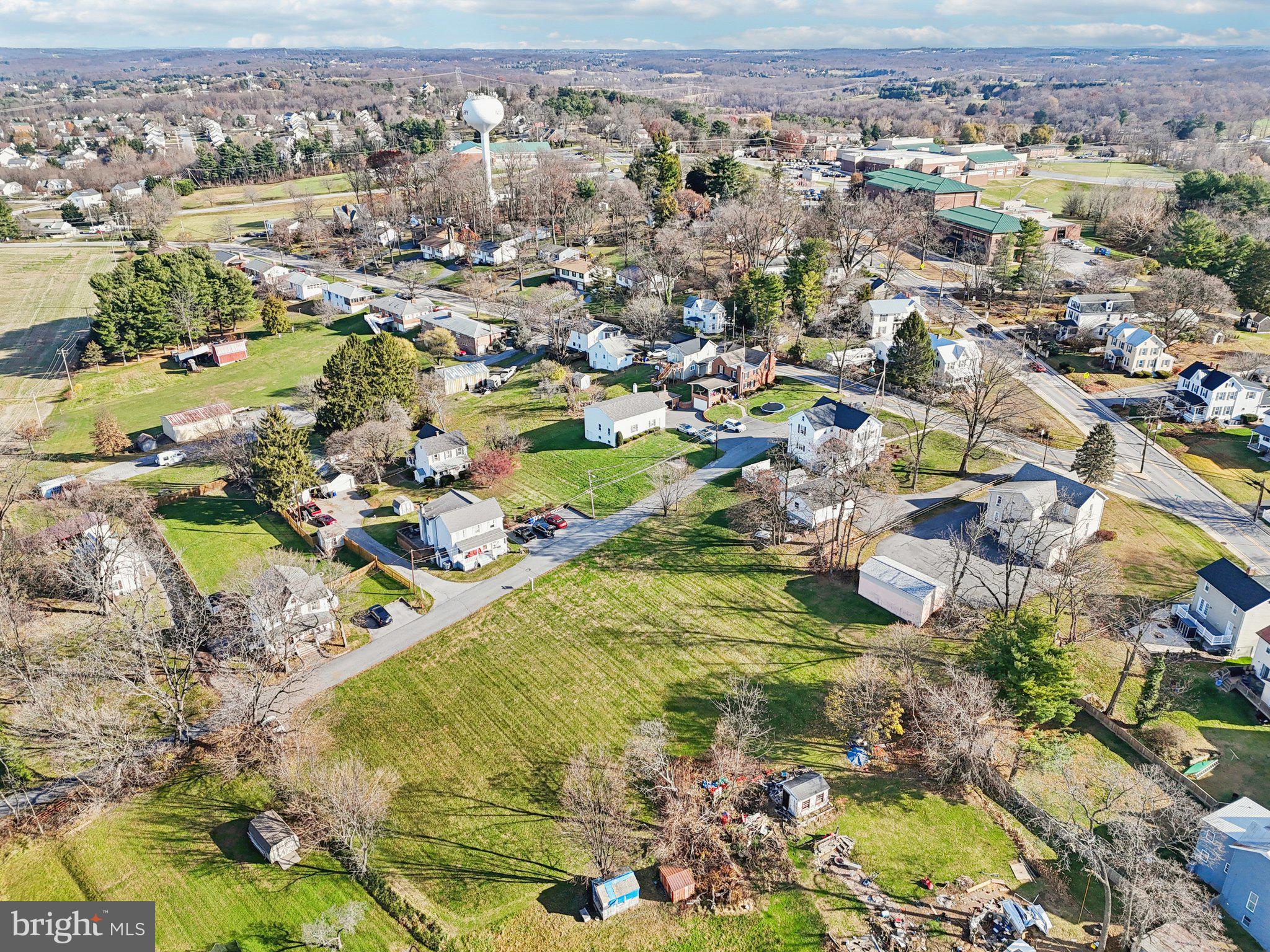 Harrison St Mount Mount Airy, MD 21771 - Photo 26 of 35 an aerial view of residential houses with outdoor space