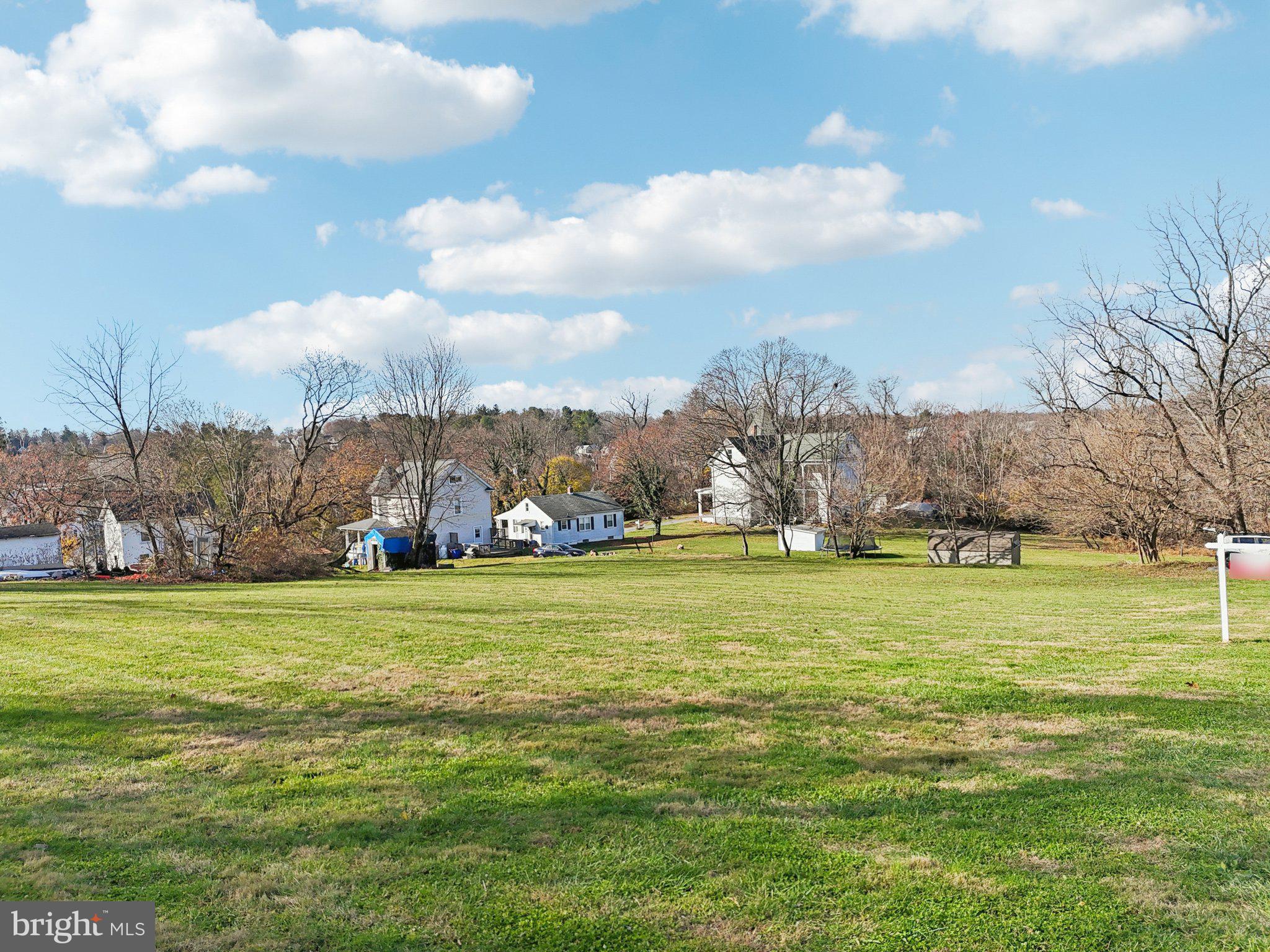 Harrison St Mount Mount Airy, MD 21771 - Photo 3 of 35 a view of a big yard next to a building