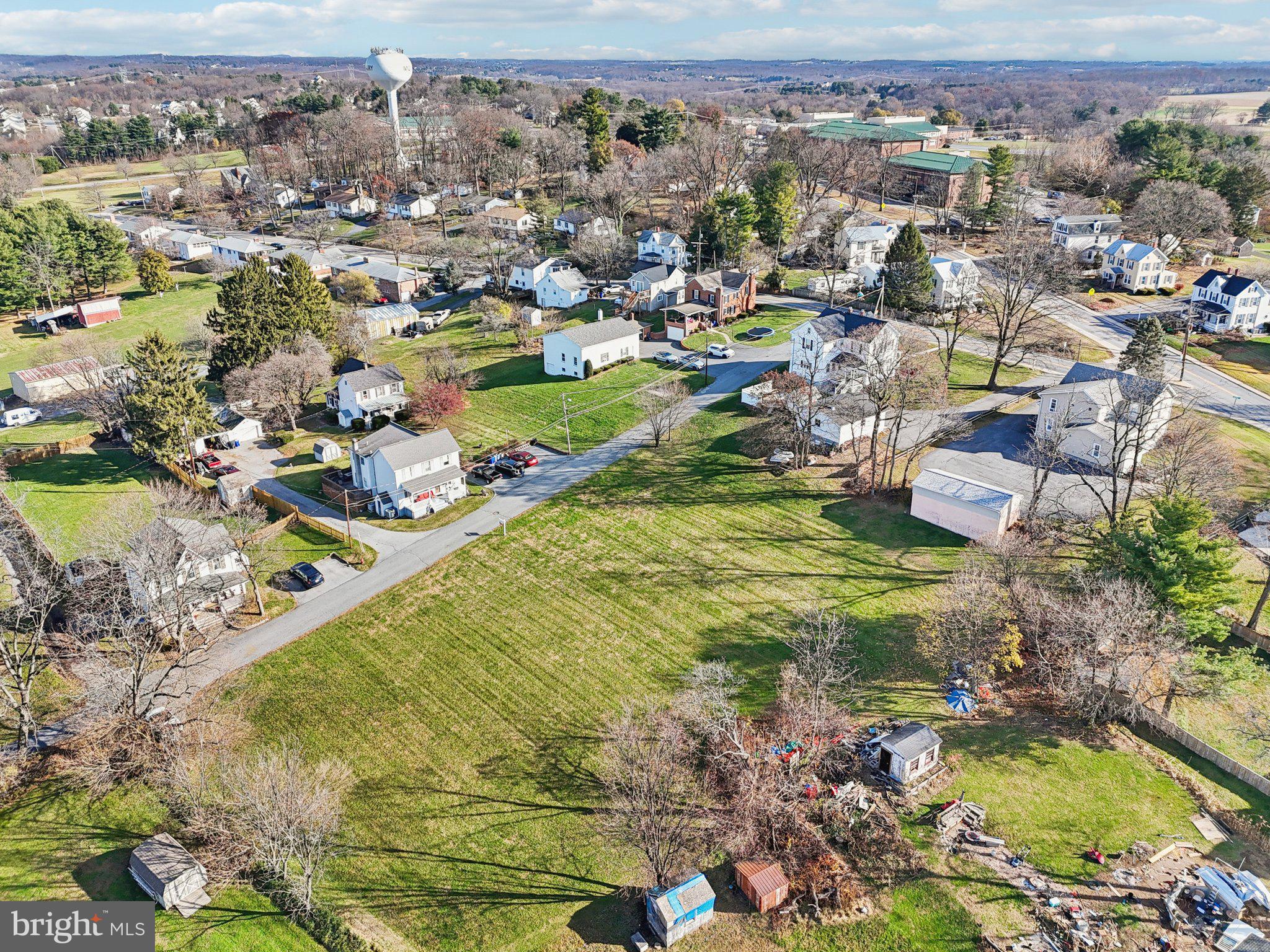 Harrison St Mount Mount Airy, MD 21771 - Photo 31 of 35 an aerial view of residential houses with outdoor space