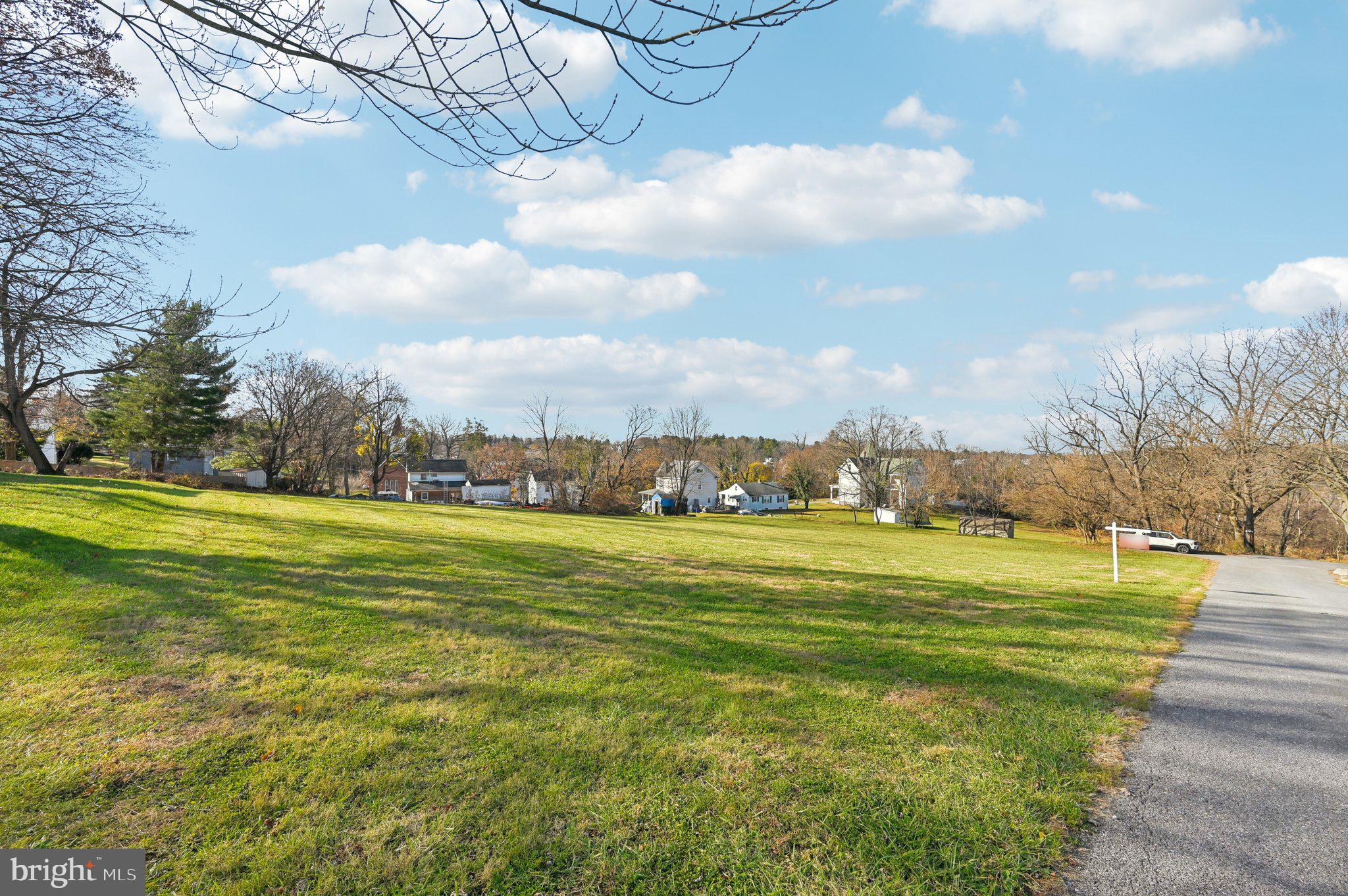 Harrison St Mount Mount Airy, MD 21771 - Photo 6 of 35 a view of a big yard with large trees