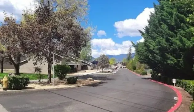 a view of a street with houses