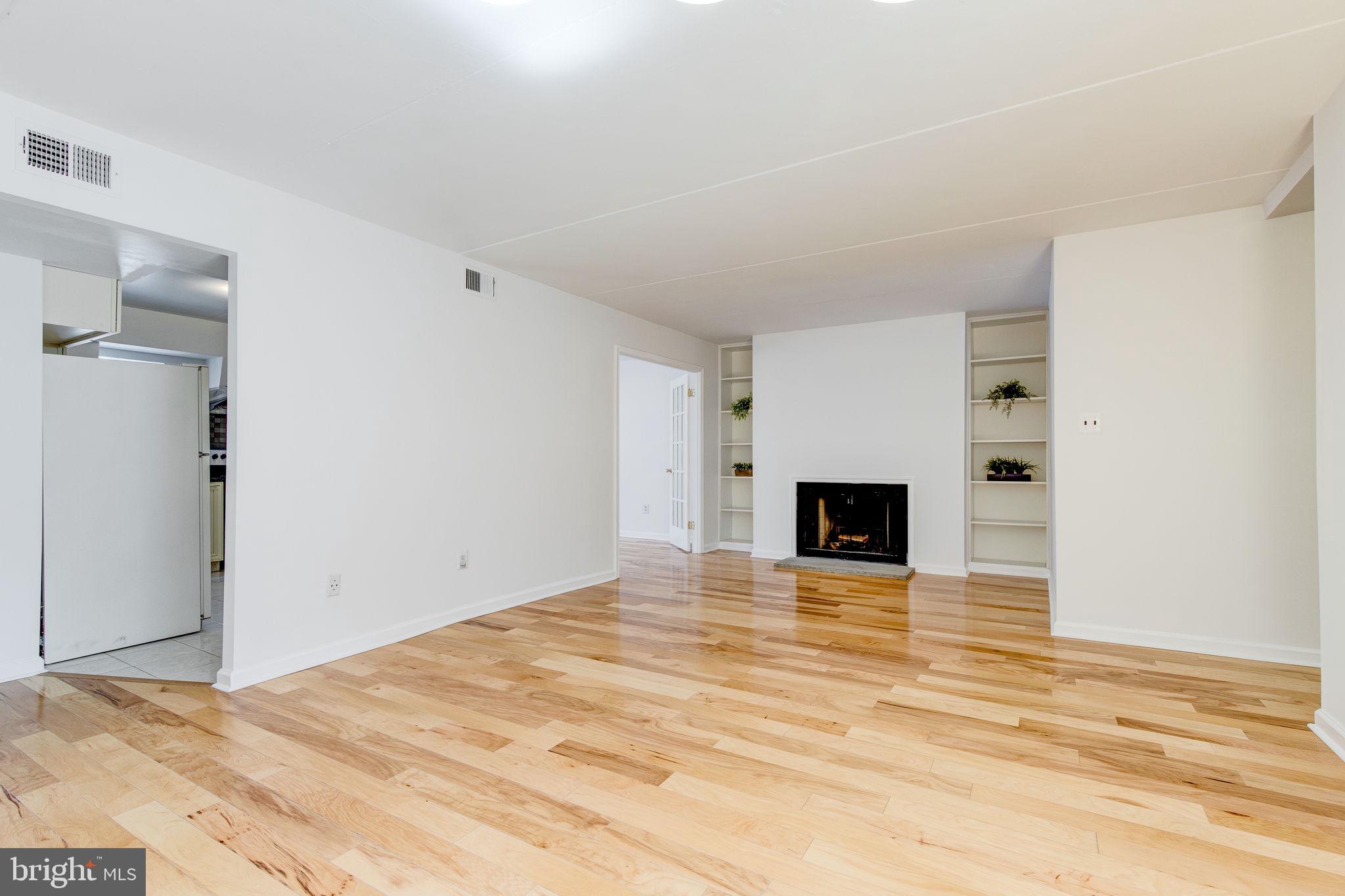 100 Rutgers Avenue, Unit 8 Swarthmore, PA 19081 - Photo 15 of 29 a view of a livingroom with a fireplace