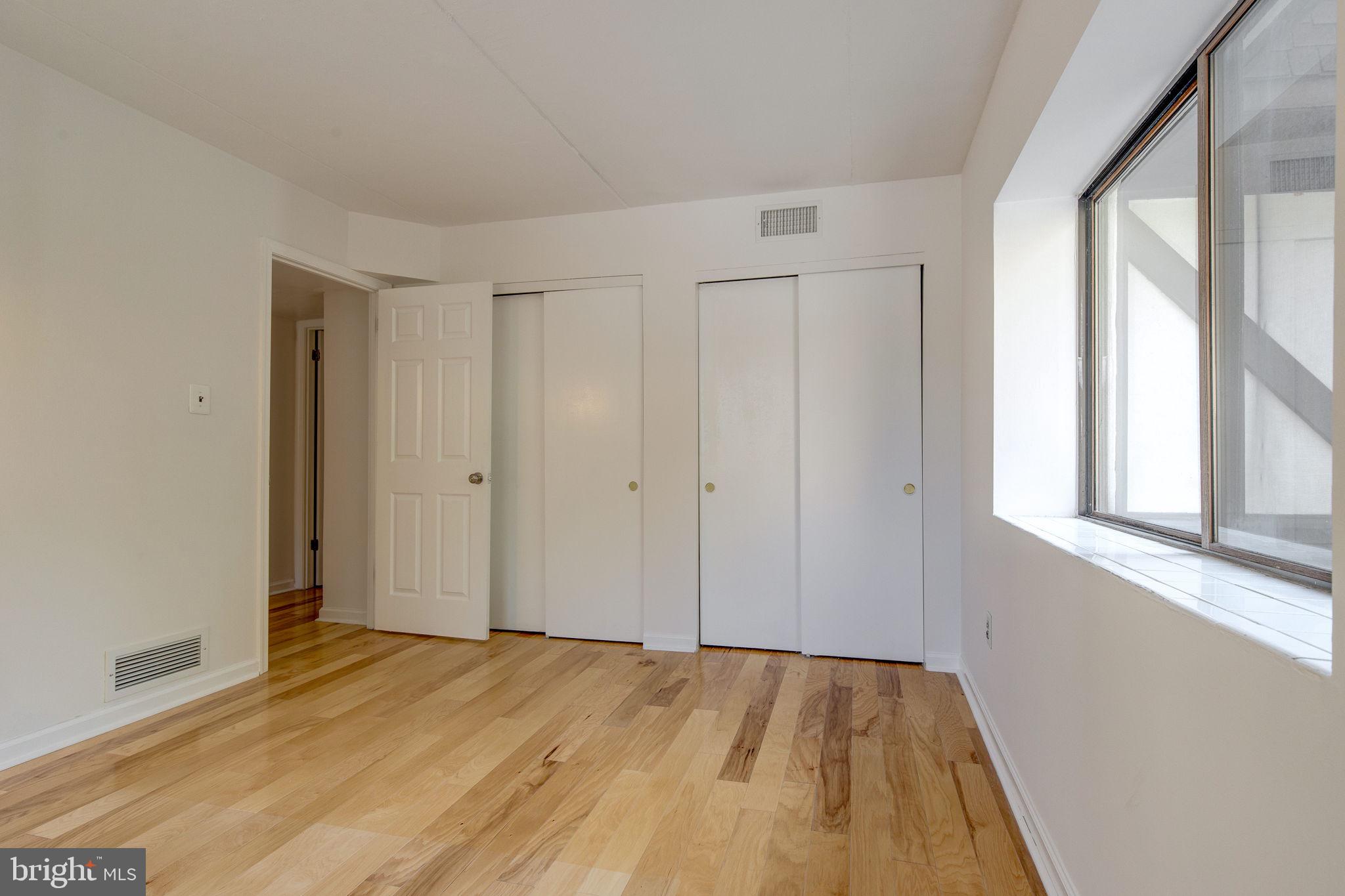 100 Rutgers Avenue, Unit 8 Swarthmore, PA 19081 - Photo 20 of 29 a view of an empty room and window