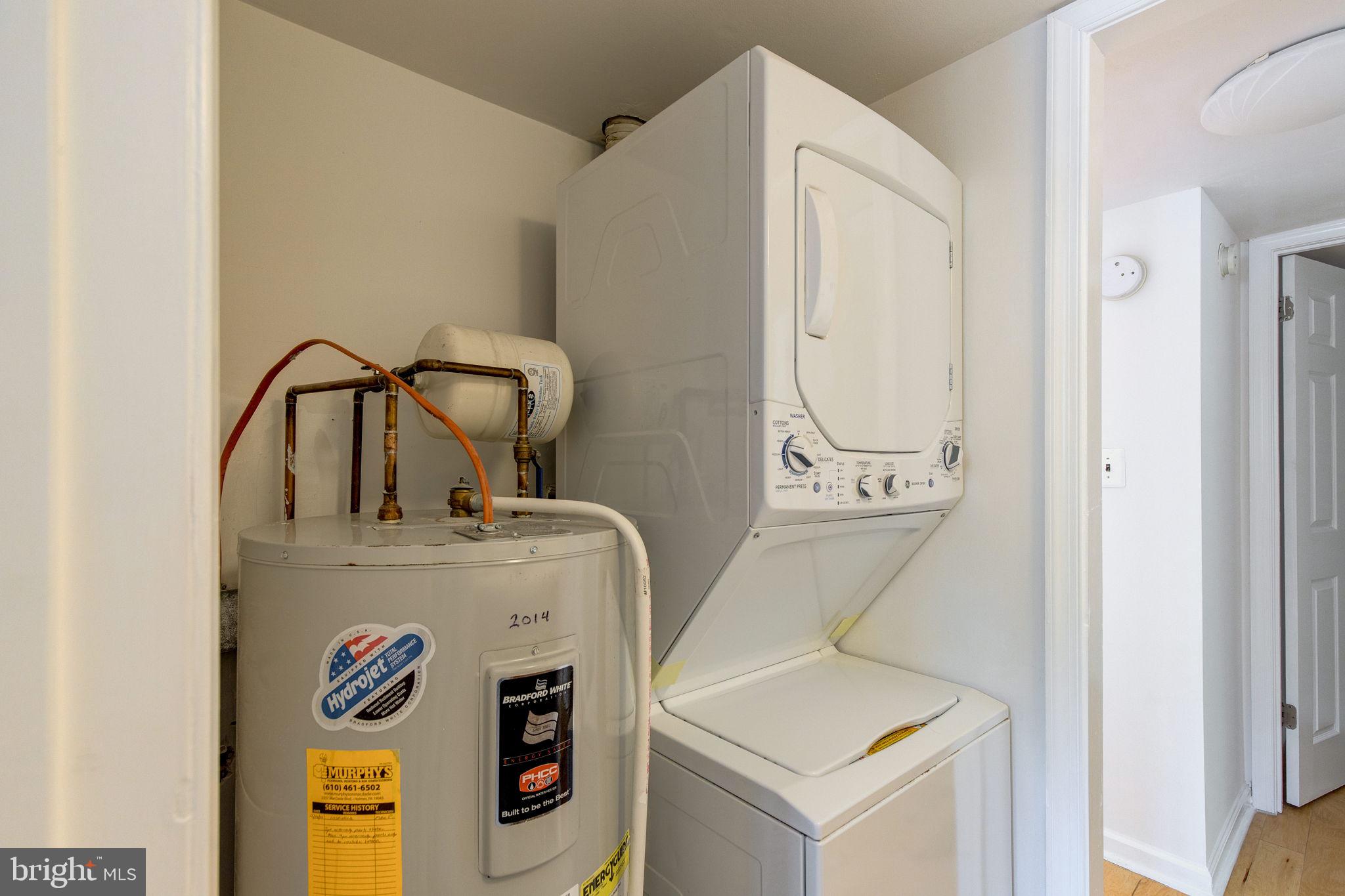 100 Rutgers Avenue, Unit 8 Swarthmore, PA 19081 - Photo 25 of 29 a utility room with dryer and washer