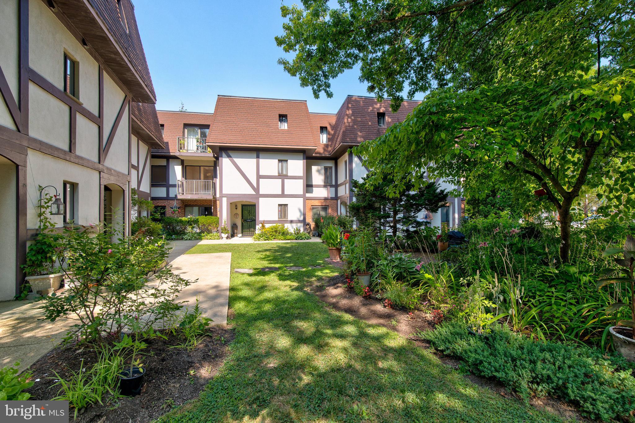100 Rutgers Avenue, Unit 8 Swarthmore, PA 19081 - Photo 5 of 29 a aerial view of a house with a yard and plants