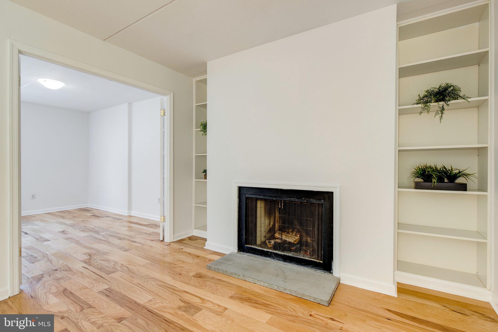 100 Rutgers Avenue, Unit 8 Swarthmore, PA 19081 - Photo 10 of 29 a view of a livingroom with a fireplace