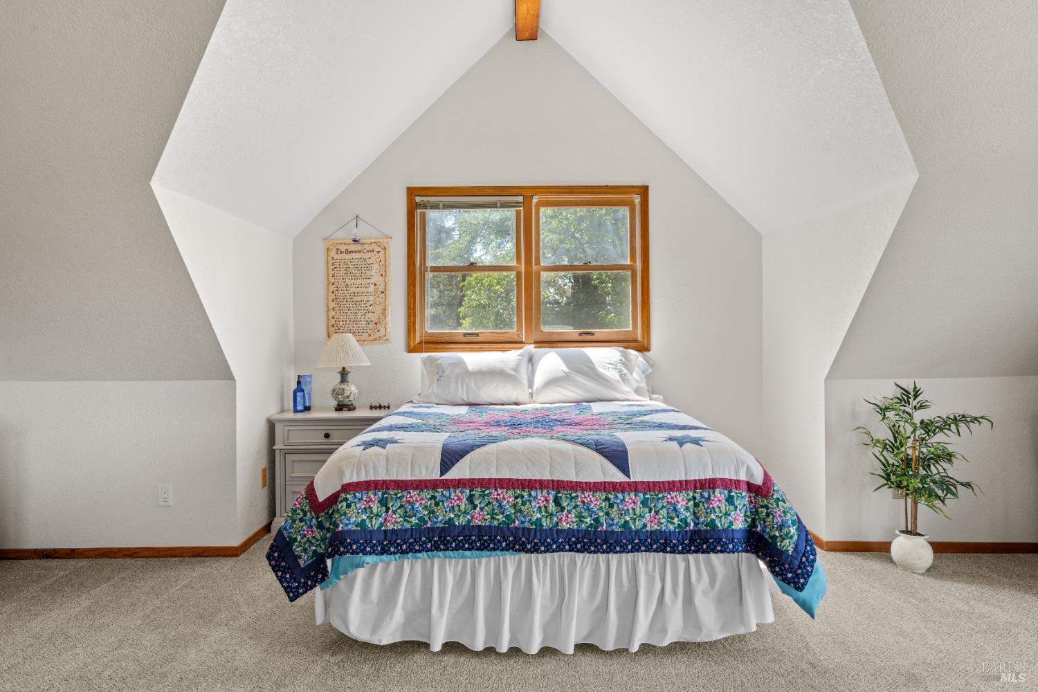 13850 Eel River Road Potter Valley, CA 95469 - Photo 14 of 26 a bedroom with a bed and a window