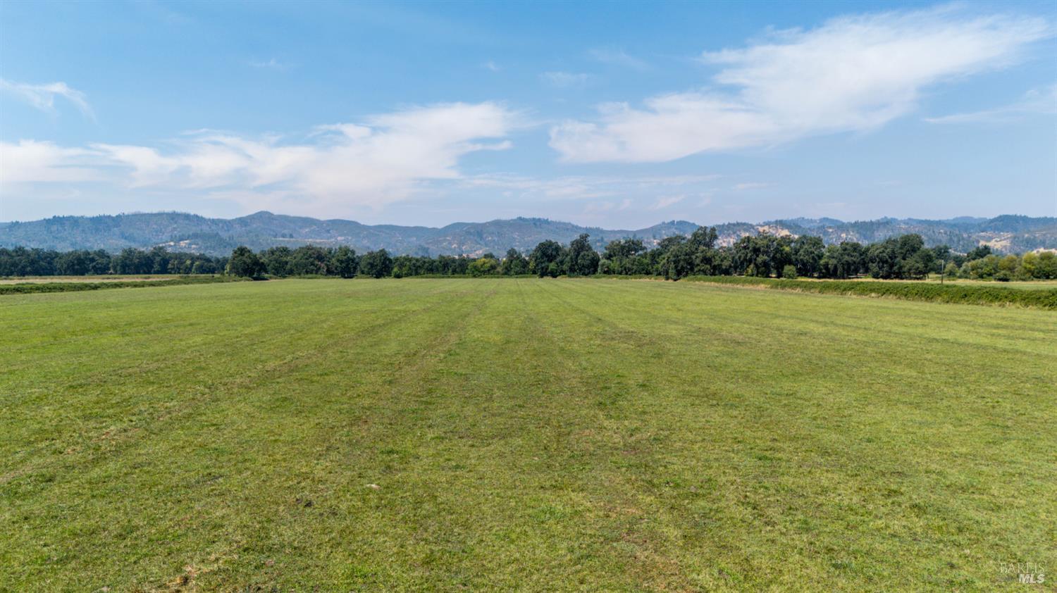 13850 Eel River Road Potter Valley, CA 95469 - Photo 25 of 26 a view of an ocean and a mountain