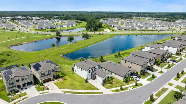 a view of yard with swimming pool and outdoor seating
