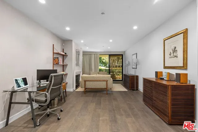 a workspace with furniture and window