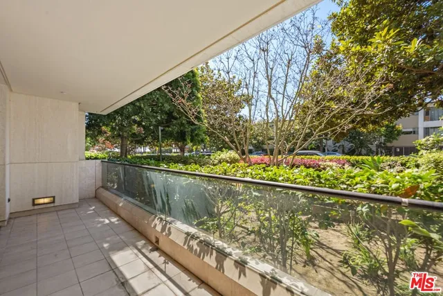 a view of swimming pool with wooden floor