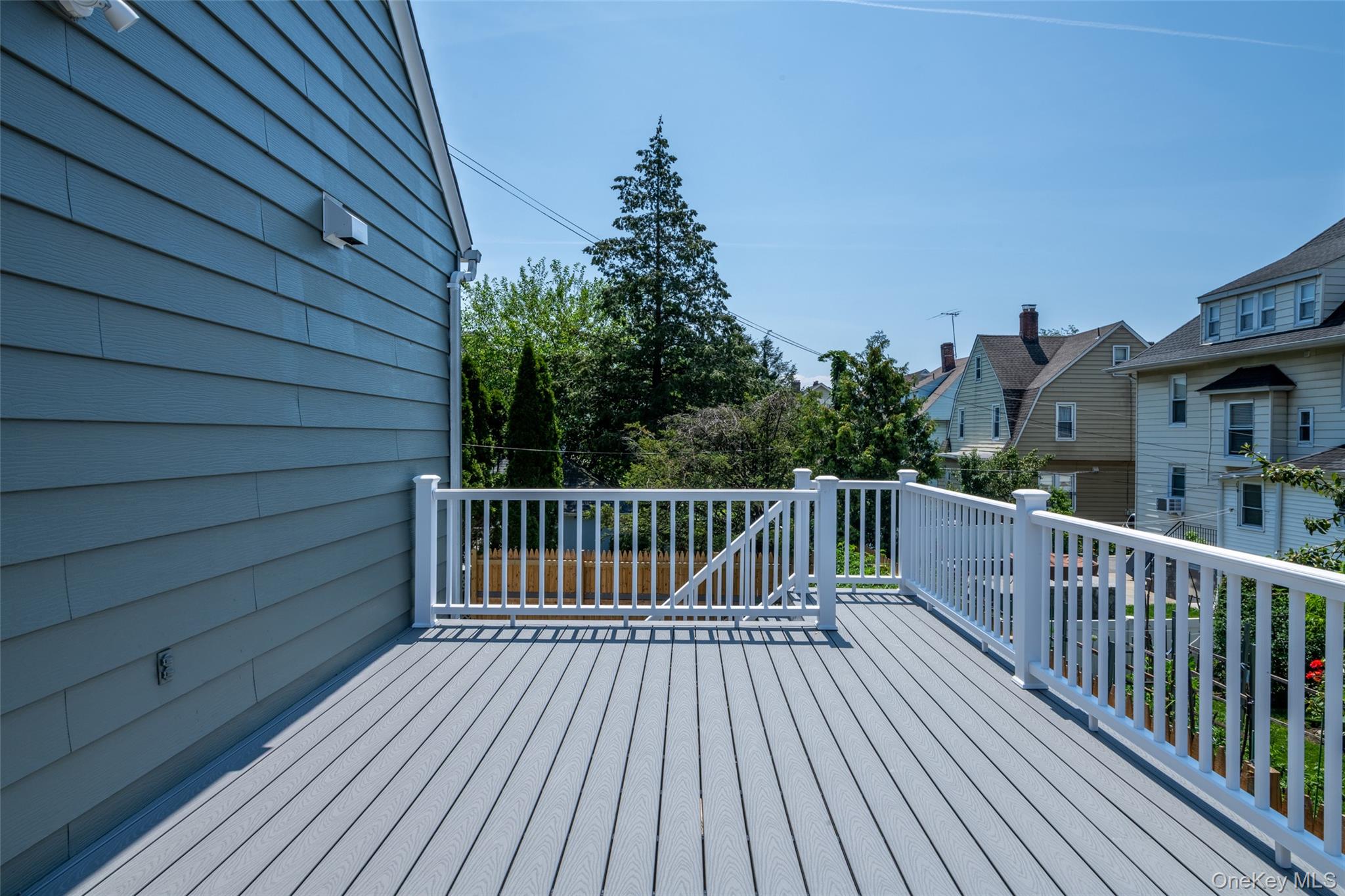 7 Alpha Place, Unit FIRST New Rochelle, NY 10805 - Photo 4 of 25 View of wooden deck
