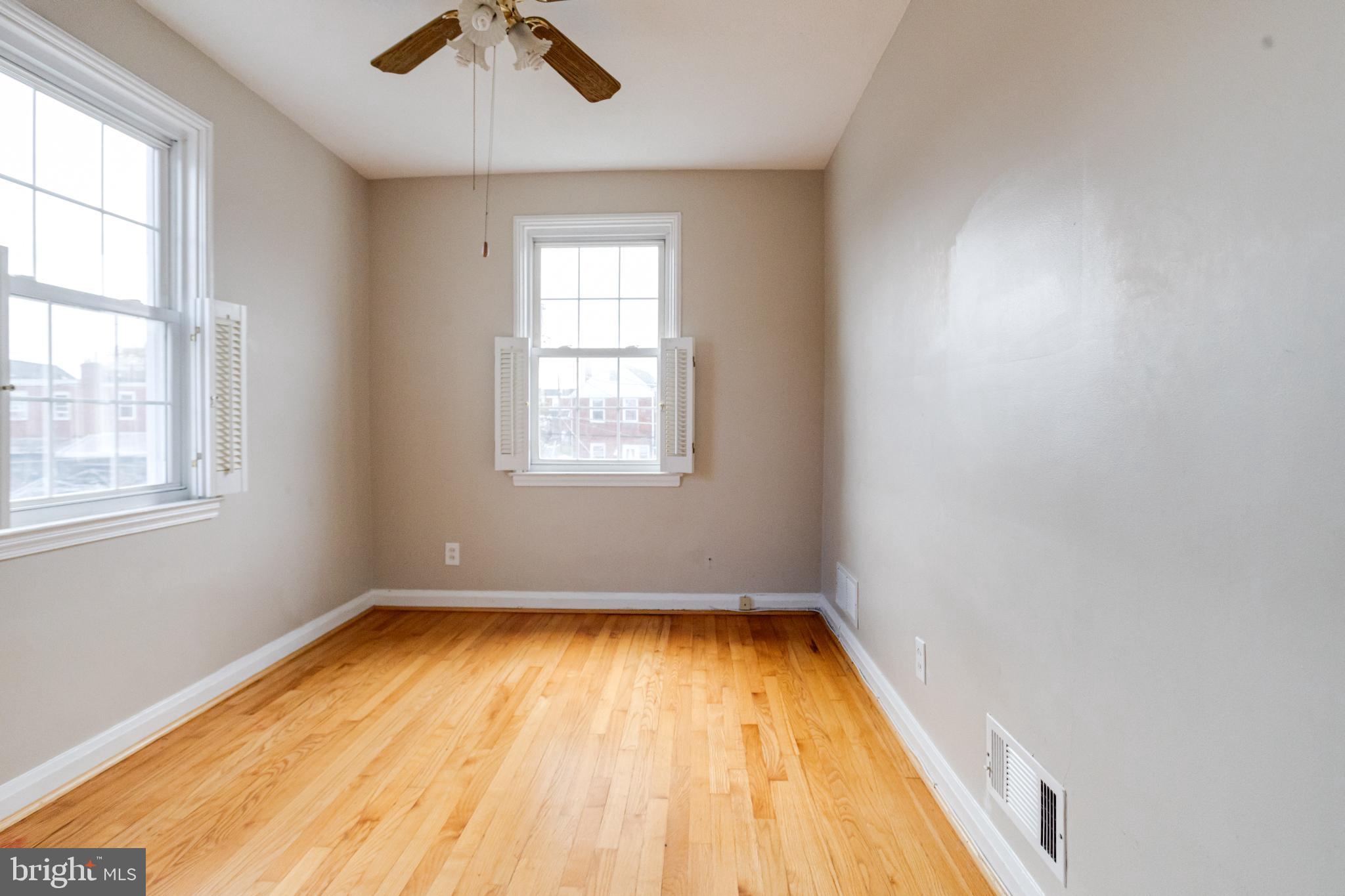 7455 Manchester Road Baltimore, MD 21222 - Photo 29 of 45 Bright and airy space with hardwood floors.