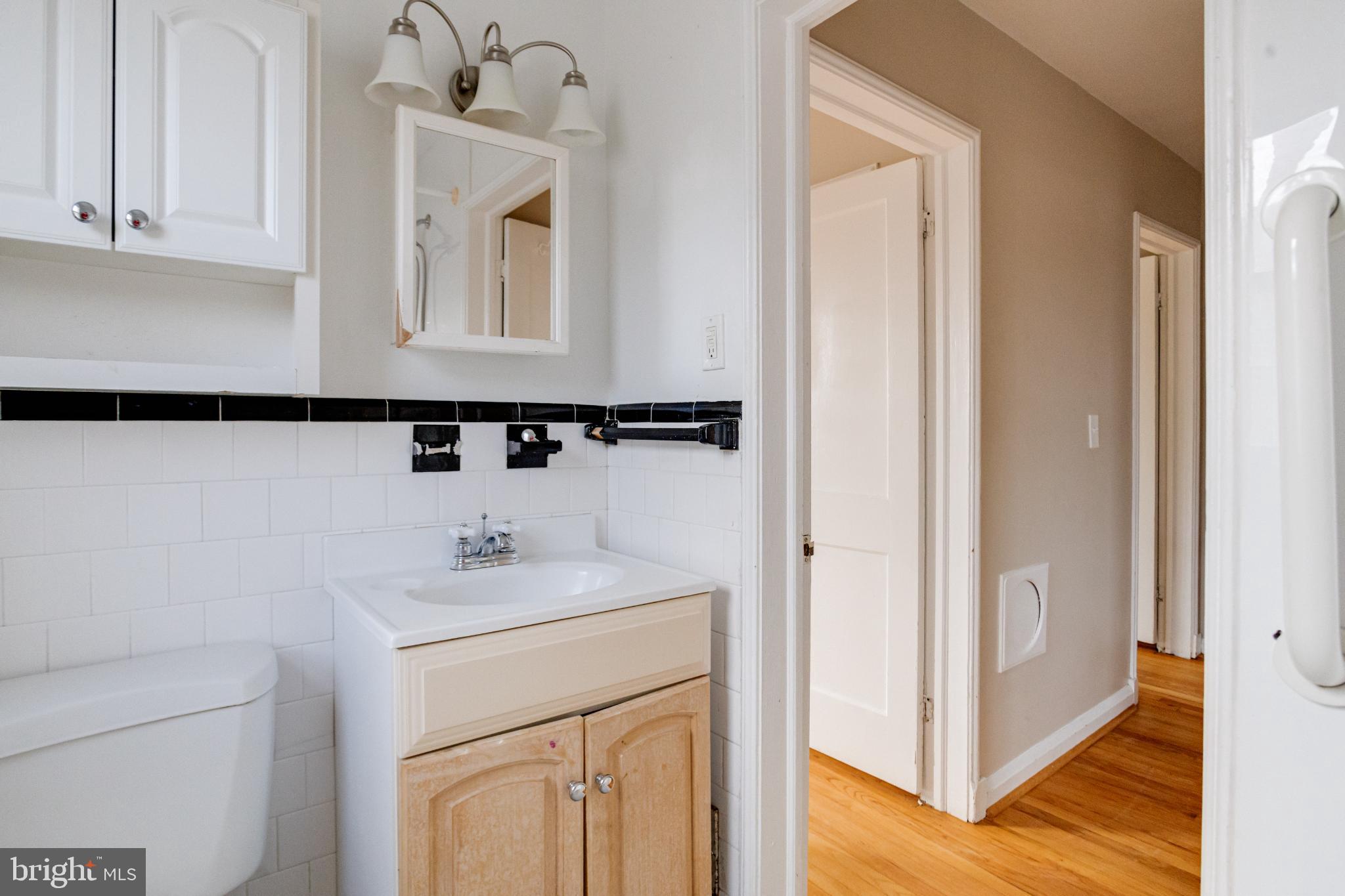 7455 Manchester Road Baltimore, MD 21222 - Photo 34 of 45 Charming bathroom with modern touches.
