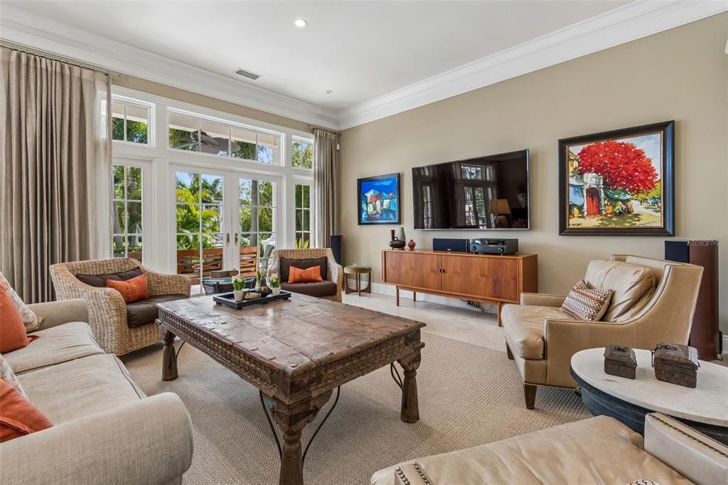 4804 Culbreath Isles Road Tampa, FL 33629 - Photo 13 of 70 a living room with furniture and a flat screen tv