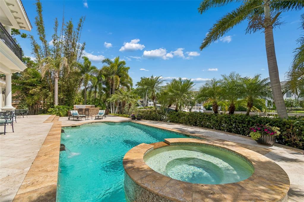 4804 Culbreath Isles Road Tampa, FL 33629 - Photo 54 of 70 a swimming pool with outdoor seating and yard