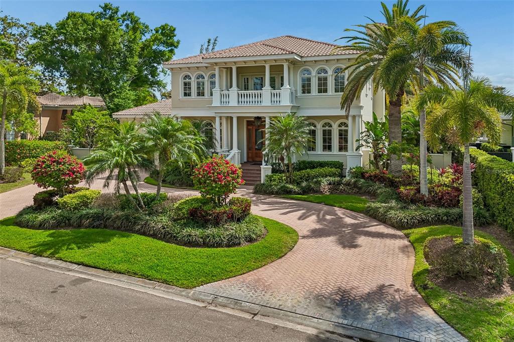 4804 Culbreath Isles Road Tampa, FL 33629 - Photo 60 of 70 a front view of a house with a garden
