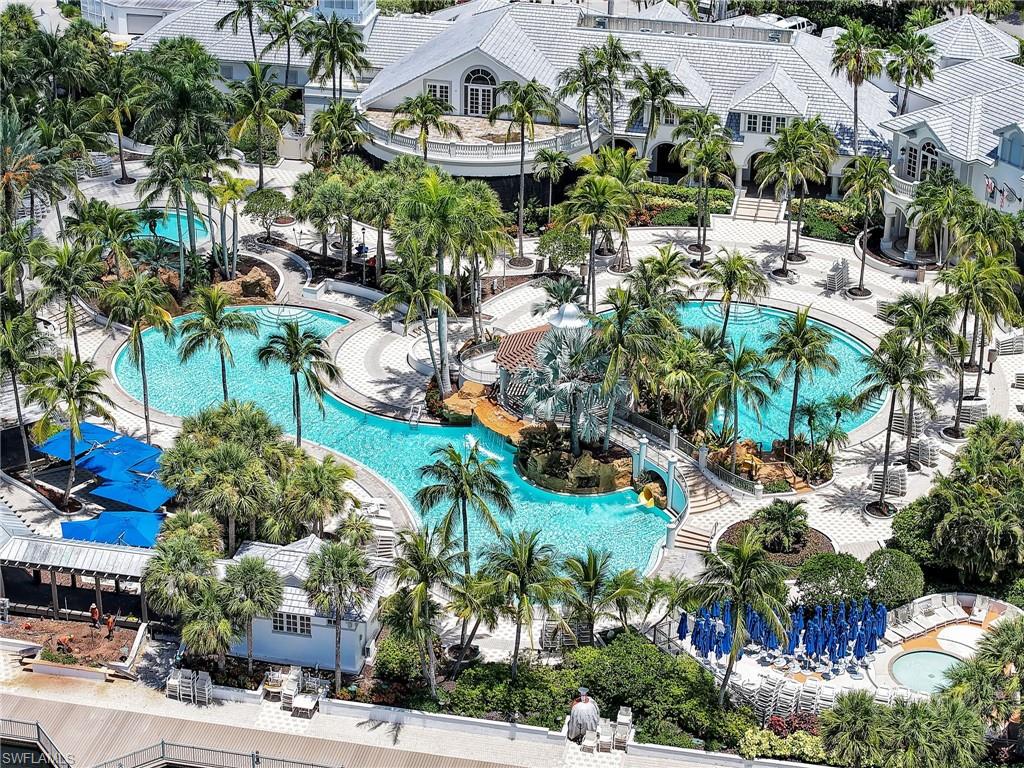 2718 Callista Court, Unit 101 Naples, FL 34114 - Photo 33 of 34 a view of multiple houses with a yard