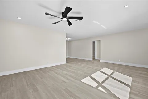 a view of an empty room with window