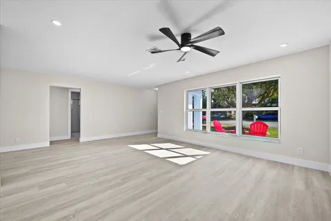 a view of kitchen with cabinets and stainless steel appliances