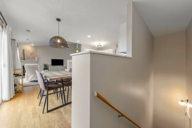 a kitchen with a table and chairs in it