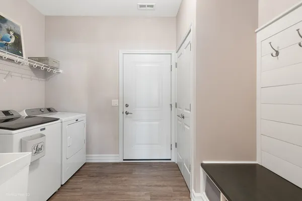 a view of a kitchen from the hallway