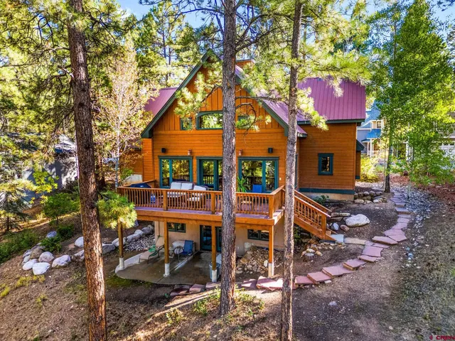 a view of a chairs and tables in the patio