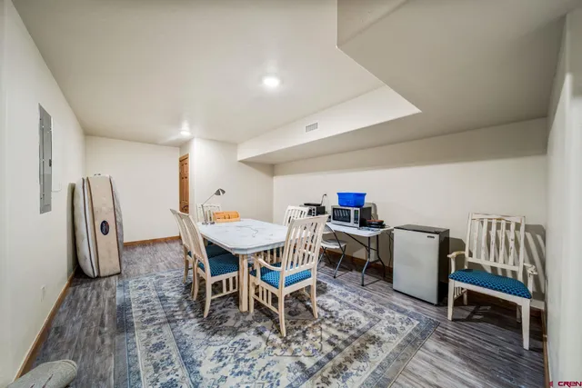 a view of a dining room with furniture
