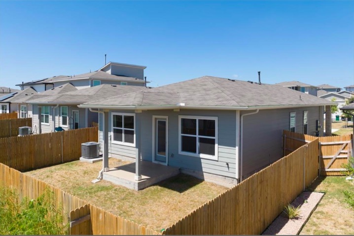 10805 Meris Lane Austin, TX 78754 - Photo 25 of 28 A private, fenced backyard offers a concrete patio and ample space for outdoor enjoyment.